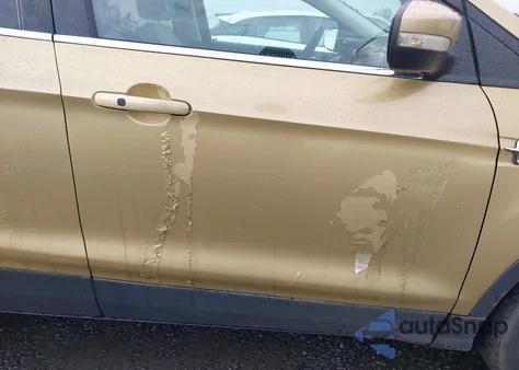 2014 Ford Escape Titanium z USA, uszkodzony, nr VIN 1FMCU0J97EUC92983